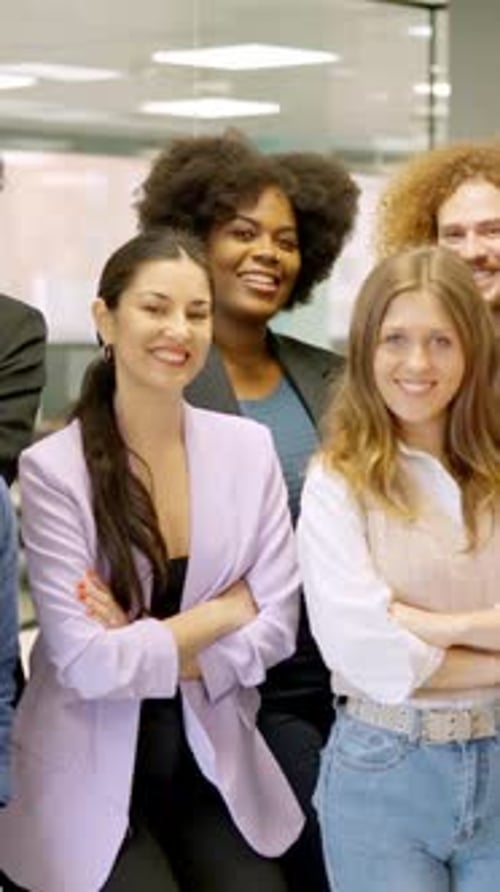 Happy Diverse Team Smiling in Modern Office