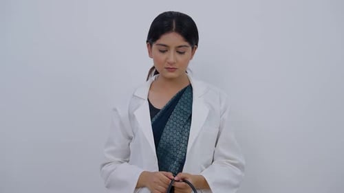 Sad Indian Female Doctor Removing Stethoscope and Feeling Bad