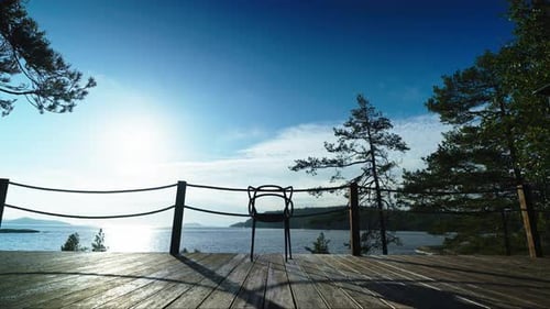 Empty Chair On Balcony Or Terrace Of Big House In Beautiful Natural Location Silhouette