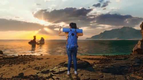 Full Body Back View Of A Female Hiker Celebrating on Beach
