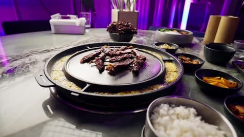 close up of delicious appetizing juicy piece of grilled meat with cheese being fried in restaurant