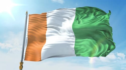 Realistic Waving Flag on a Flagpole with Blue Sky