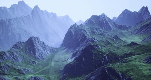 Majestic Mountain Range at Dawn Wrapped in Soft Mist and Serene Beauty