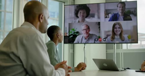 Businesspeople Having a Video conference in a Office Meeting room