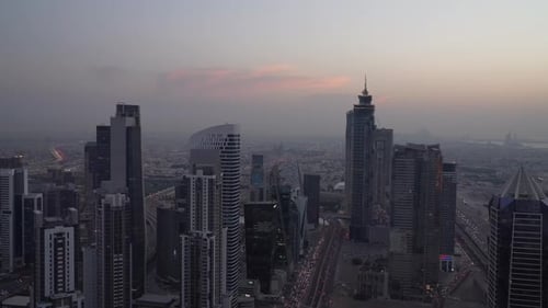 Night video Skyscrapers and towers in the atmosphere of the city of Dubai