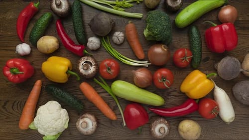 Fresh Vegetables and Mushrooms Aerial Shot on Wood