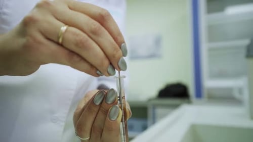 Blood Sample Prepared with Needle and Glass Tube