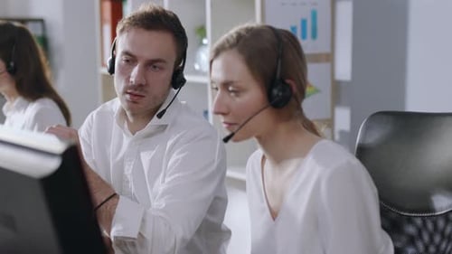 Close Up Young People Woman Man Talk Operator Taking Calls Smile in Call Center Office Business