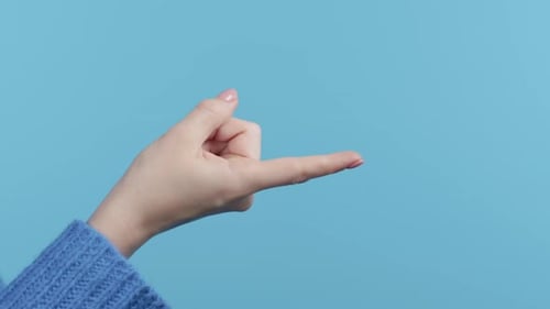 Unrecognizable Woman Giving Beckoning Finger Sign