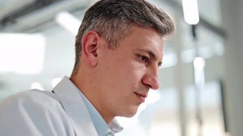 Scientist Concentrating in a Laboratory Close Up