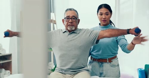 Senior Man Exercising with Physical Therapist