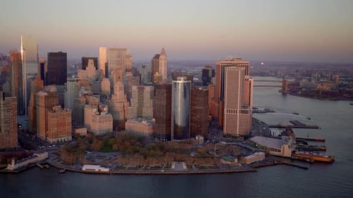 Take in the Stunning Aerial View of a City Skyline As It Glows Beautifully at Dusk