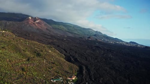 Aerial drone shot over the erupted volcano of Tajogaite in La Palma Island, Canary Islands, Spain. H