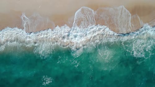 Mesmerizing Ocean Waves Sandy Shoreline Aerial Top View Expanse Ocean Majestic Waves Sandy Beach