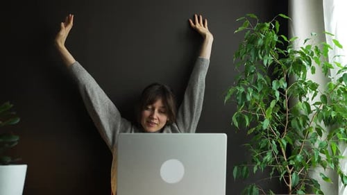 Freelancer Woman Stretching Arms Working Home Office