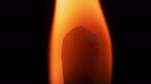 Burning Match Stick with Flickering Orange Flame