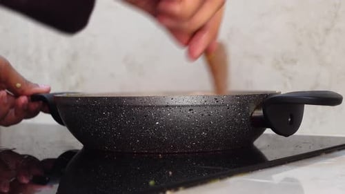 Close-up of Food Stirred in Pan