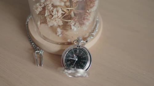 Vintage Pocket Watch and Flowers under Glass Dome