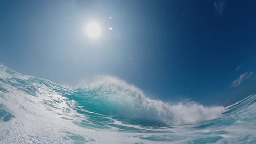 Ocean Wave Breaks on the Shore in the Maldives with Water Directly Hitting the Camera
