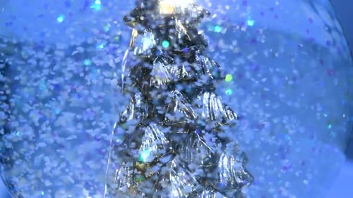 Snow globe with Golden Christmas tree