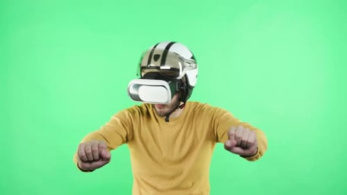 Man driving simulation with VR and helmet