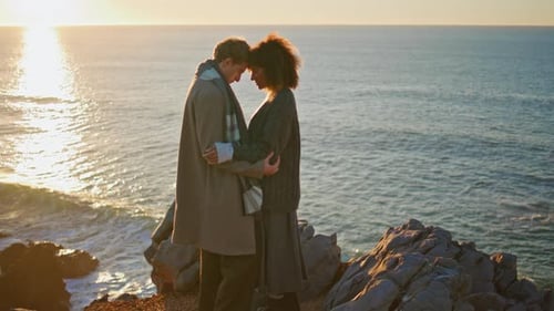 Loving Pair Bonding Sunset Coast Hill Diverse Couple Enjoying Moment Together