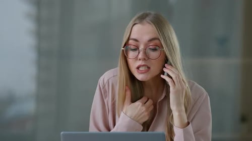 Angry Caucasian Business Woman Talking Mobile Phone at Office Stress Frustrated Mad Negative