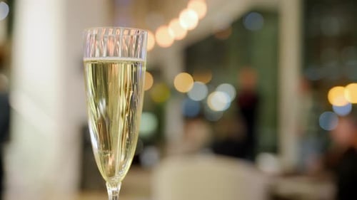 Bubbling Champagne at a Luxurious Nighttime Party