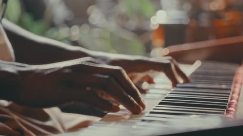 Close-Up of Hands Playing Acoustic Upright Piano with Exposed Mechanics