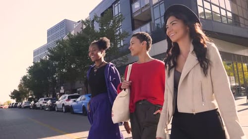Women Friends Walking Crossing Sunny City Street Slow Motion