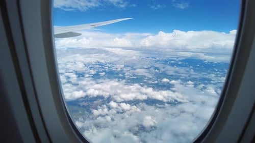 Bright Cloudscape View From the Airplane Window