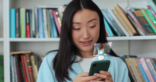 Woman Uses Holographic Dating App on Smartphone