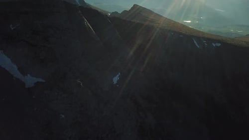 Cinematic Aerial of Mount Evans Peaks in SummIt Lake Park, Under Sunset Sunlight. Colorado USA