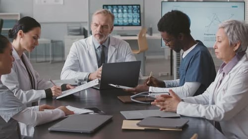 Medical Professionals Talking in a Corporate Meeting