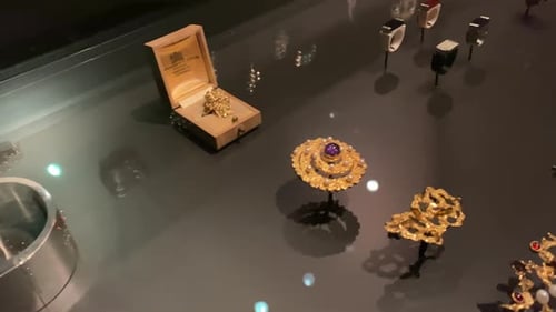 Visitors walking around the museum and magnificent historical antiques