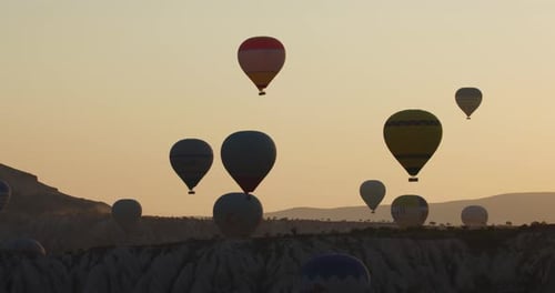 Hot-air ballooning in Cappadocia, Turkey, at sunrise
