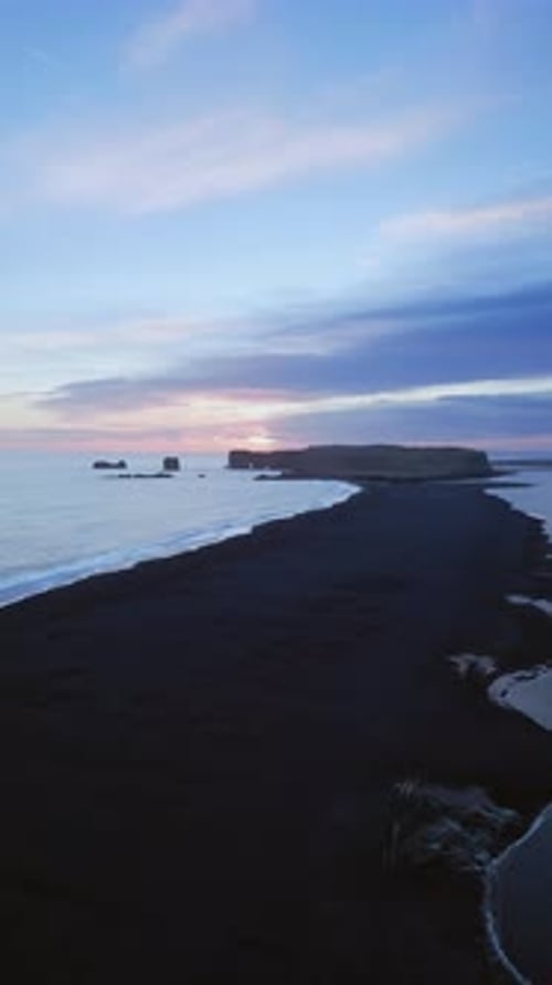 Vertical Video Drone Shot of Black Sand Beach