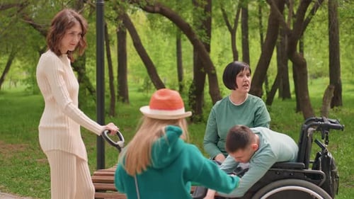 Helping Handicapped Man Walk Peacefully Beside Family Kind Volunteer Aids Physically Challenged Man
