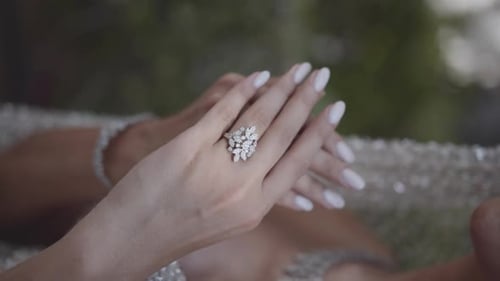 Woman's Hand with Diamond Ring Close Up