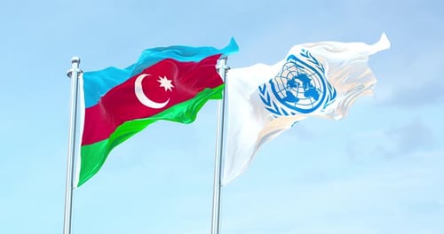 Azerbaijan and United Nations Flags Waving Together