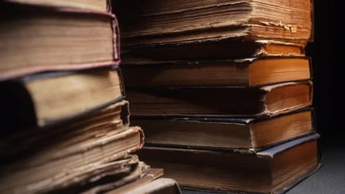Macro View of Saved Medieval Books with Ancient Writings Religious Literature Archival Manuscripts