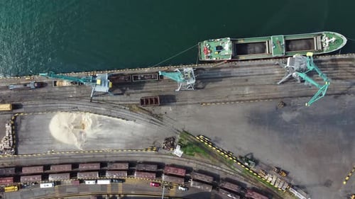 Aerial Shot Of Cargo Operations. Port Crane Aerial