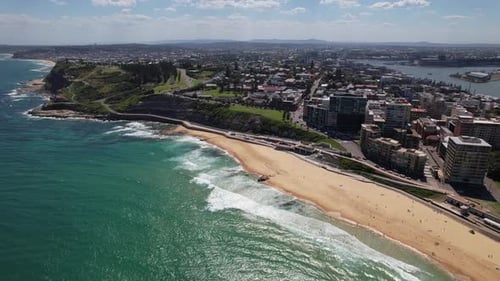 Newcastle Beach And Harbor City With Beachfront Hotels In New South Wales, Australia. - aerial shot