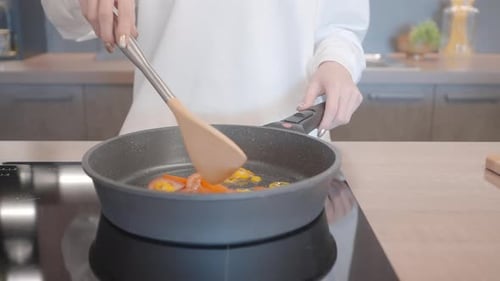 Cooking Vegetables in Pan on Stovetop