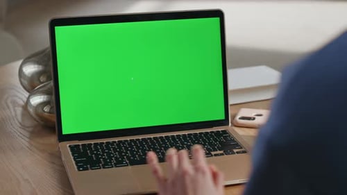 Freelancer Using Laptop Green Screen on Workspace Closeup Hands Touching Mockup