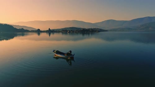 Aerial View Fishing on the Lake at Sunset