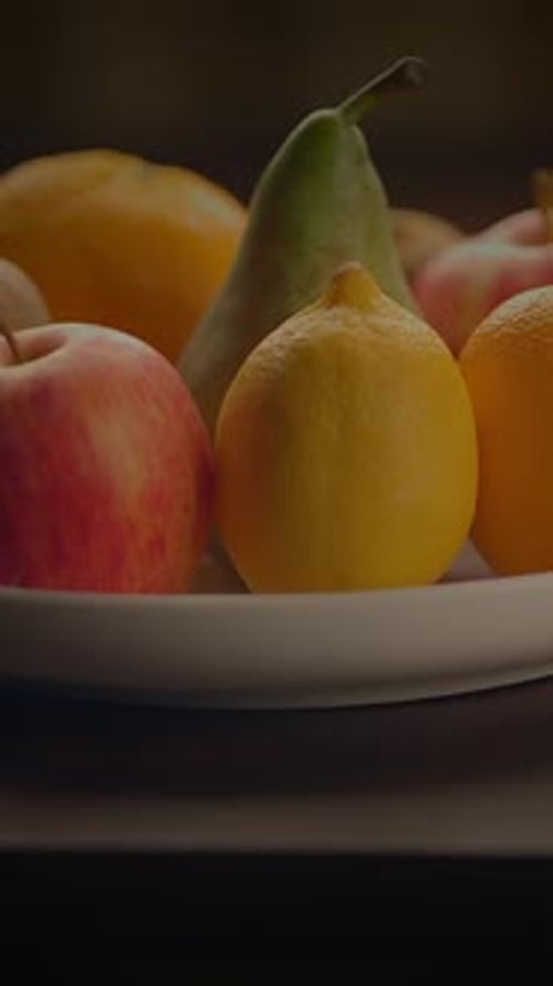 A Stunning Arrangement of Fresh and Colorful Fruits on a Plate for a Healthy Lifestyle