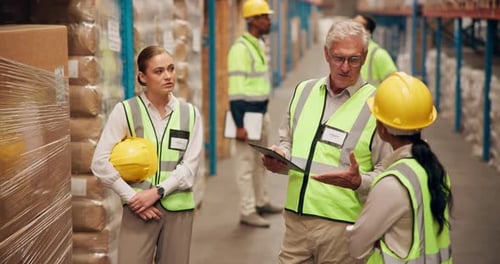 Planning, manager and group of people in warehouse for discussion, collaboration