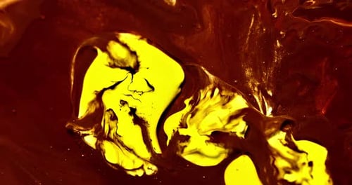 Yellow Liquid Swirls into Dark Brown Abstract