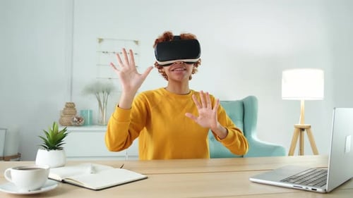 Young Woman Using Virtual Reality Headset at Home